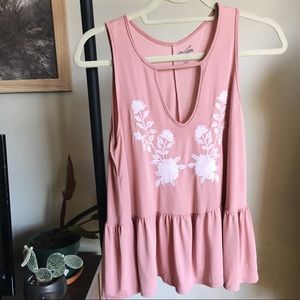 Francesca’s Alta floral embroidered peplum top